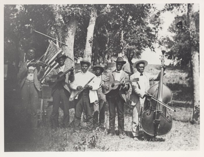 Photo credit: Grace Murray Stephenson via The Portal to Texas History, Pictured: an African American band on Emancipation Day, June 19, 1900Picture
